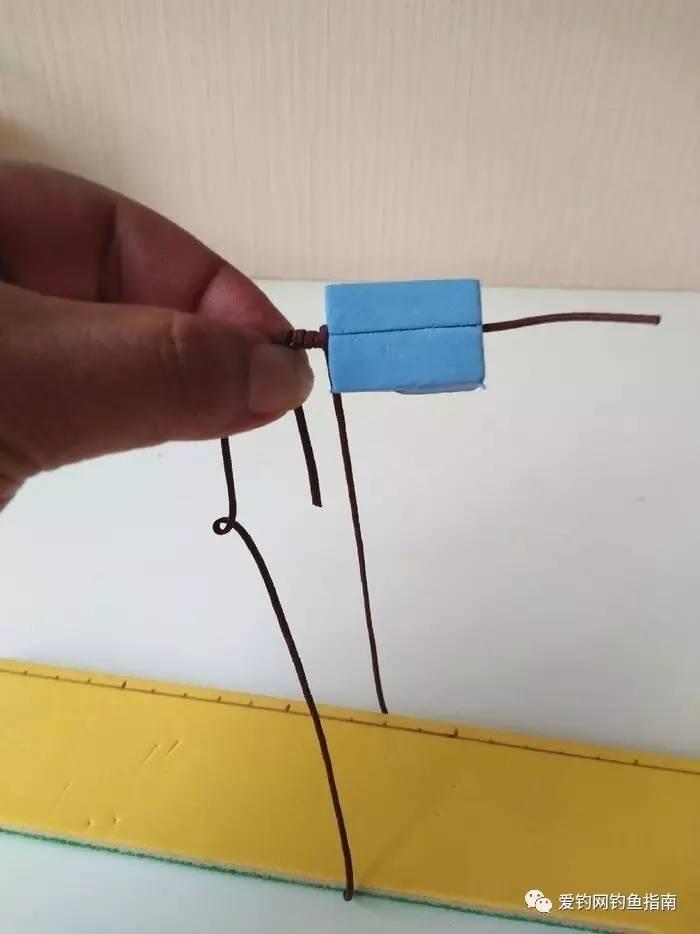 怎么利用蝴蝶夹绑鱼钩视频,用橡皮绑鱼钩教学视频
