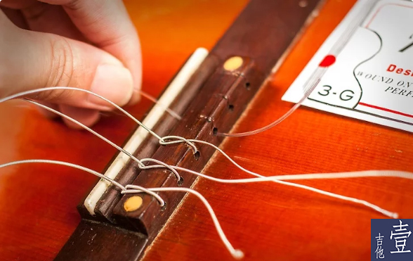 北航吉他,如何换吉他新弦