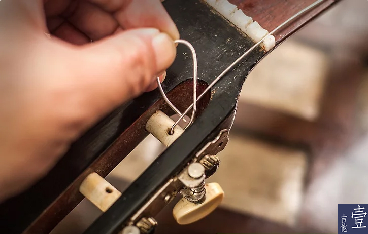 北航吉他,如何换吉他新弦