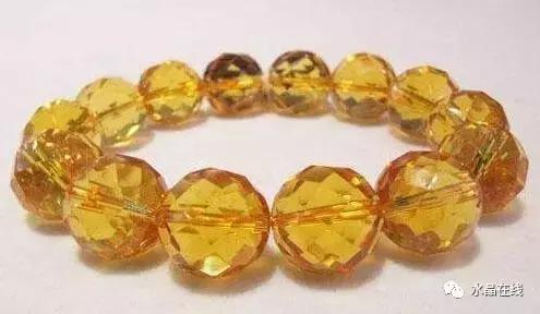 黄水晶千手观音吊坠真假,纯净体黄水晶怎么辨别真假