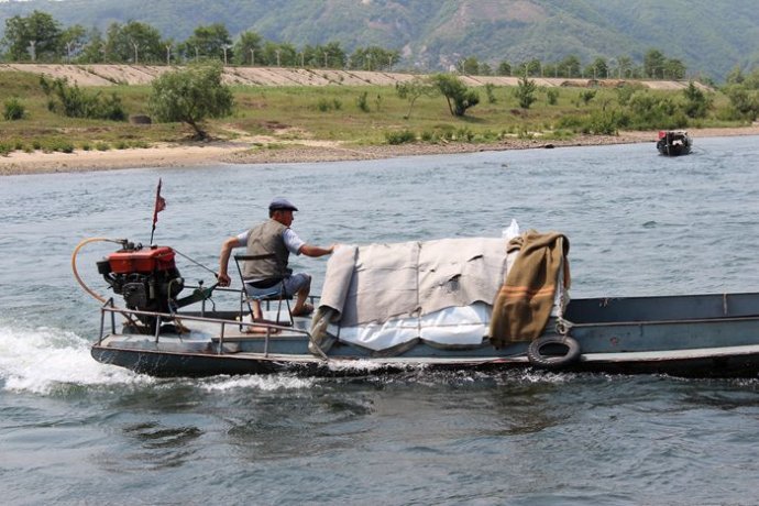 中朝边境美丽的风景,中朝边境桃花盛开的地方
