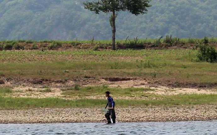中朝边境美丽的风景,中朝边境桃花盛开的地方