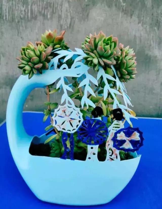 洗衣液瓶改造成花瓶怎么改造,空洗衣液瓶改造成花瓶的教程