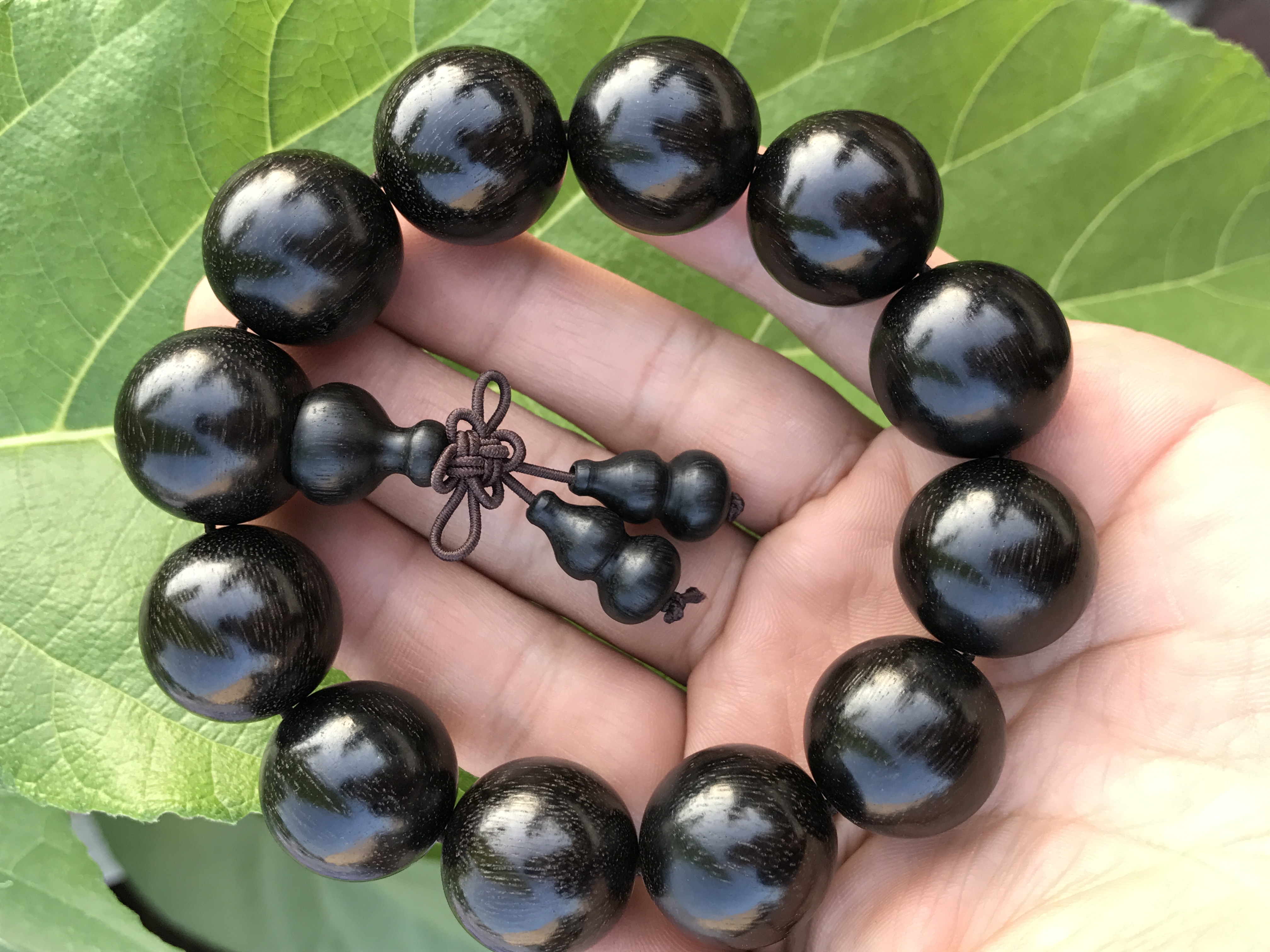 乌木佛珠手串怎么盘,手工金丝楠木佛珠手串图