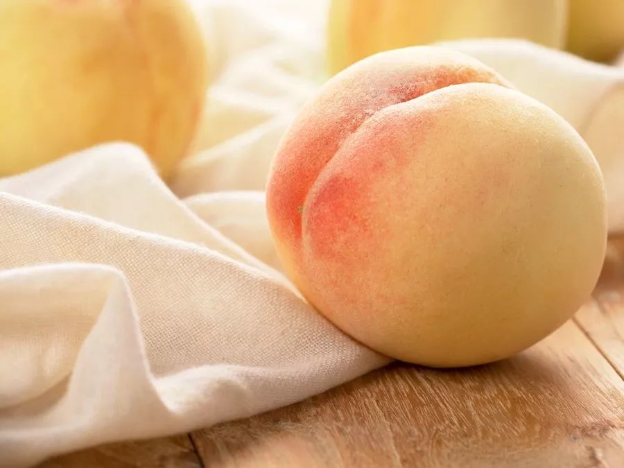 一个桃子半斤有多大,一个桃子二斤三两