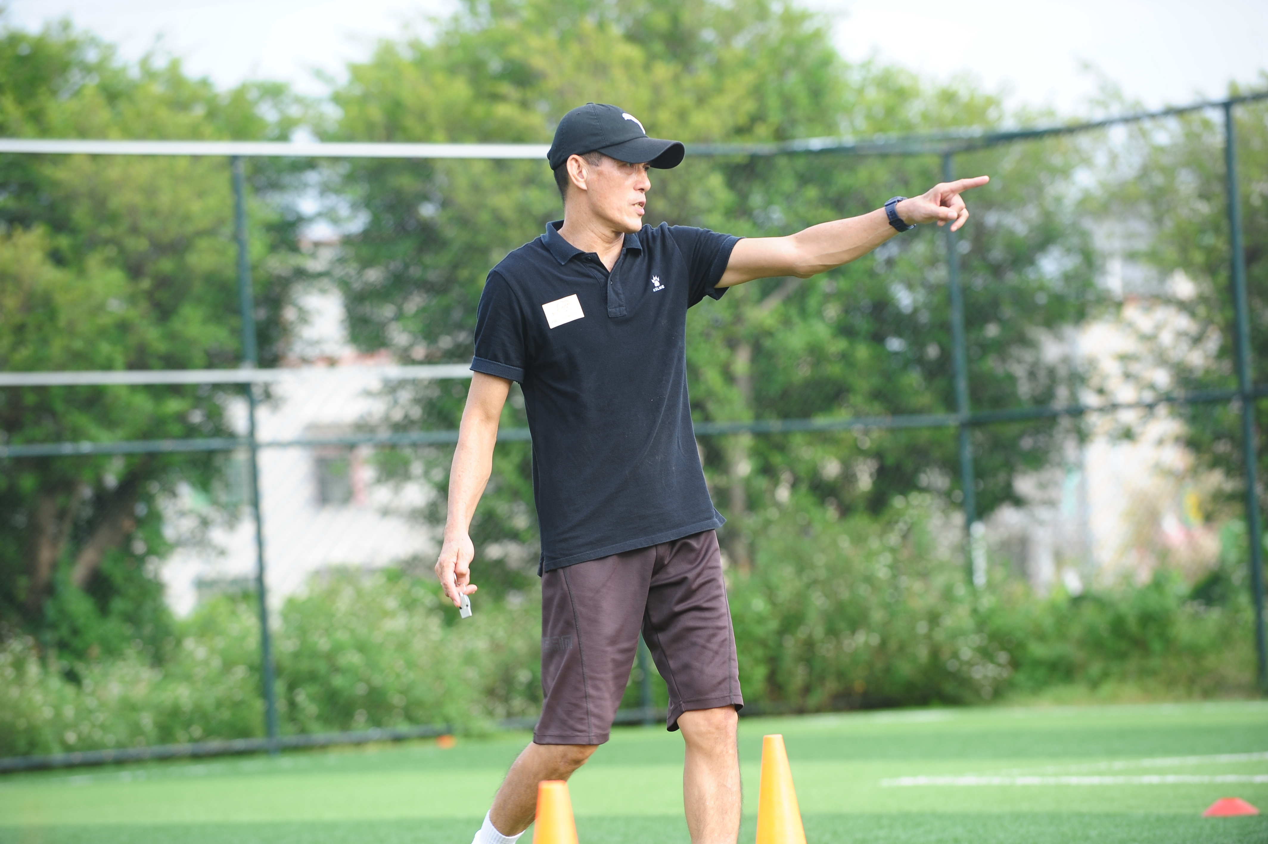 用双手守住湛江足球的未来,陈建中教练