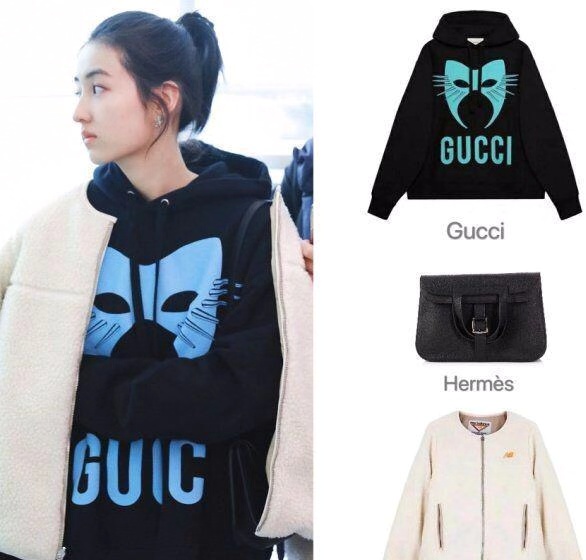 张子枫背大牌包包现身机场,张子枫穿西装现身机场