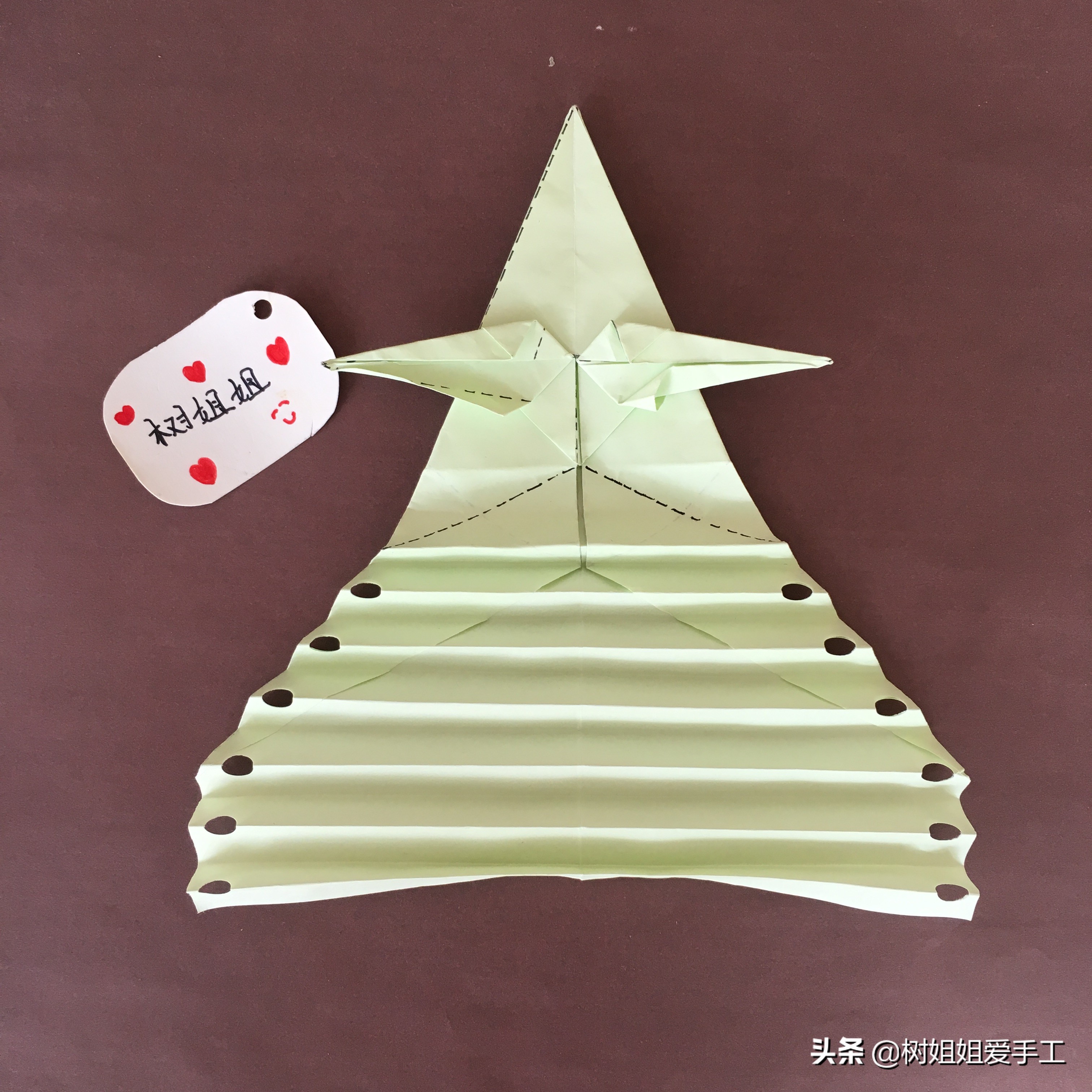 拖尾孔雀的三角插教程,折纸孔雀尾巴怎么折