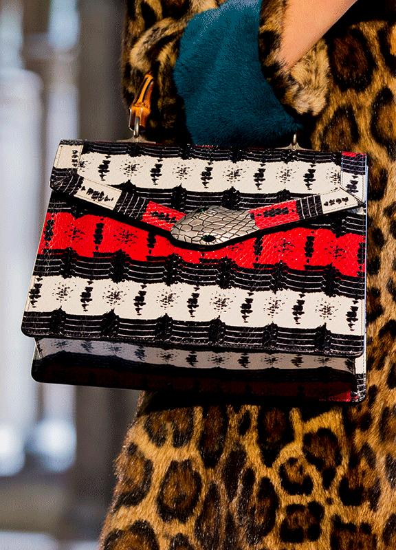 gucci设计理念是什么,gucci品牌标志性设计元素