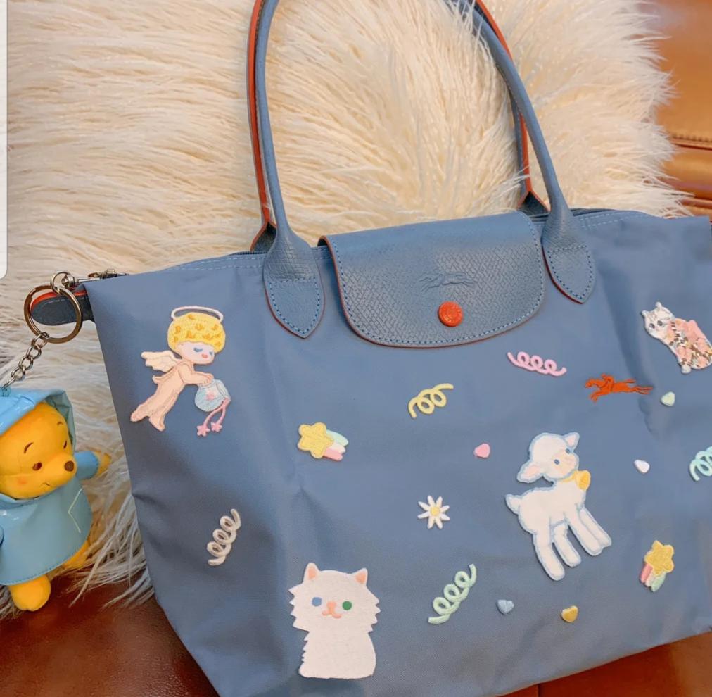 背包女双肩包时尚2022新款中年,中年男人背双肩包还是单肩包有范