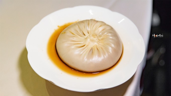 蟹黄汤包是不是靖江人发明的,蟹黄汤包是哪里的传统小吃