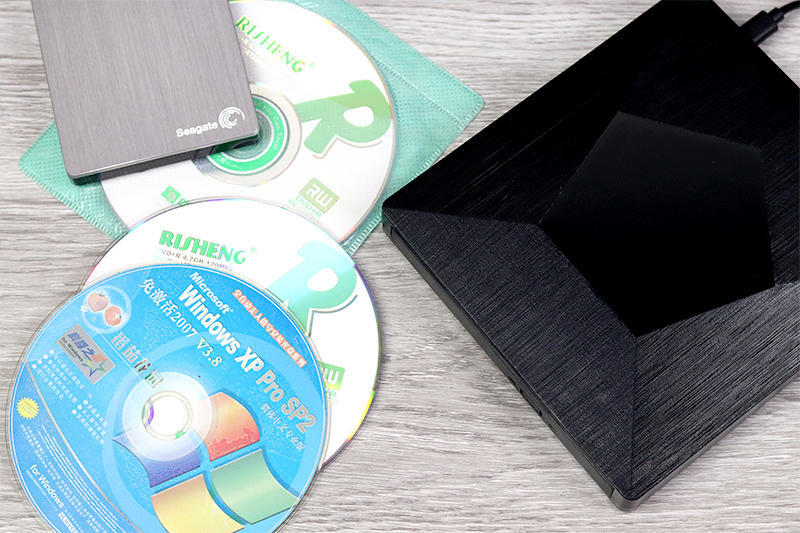 光盘在光驱里会一直转吗,光盘在光驱里转不动