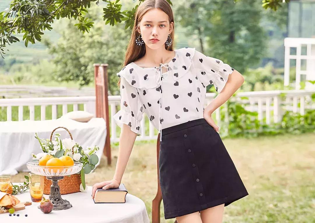 拉夏贝尔童装图案遭质疑,拉夏贝尔假货争议