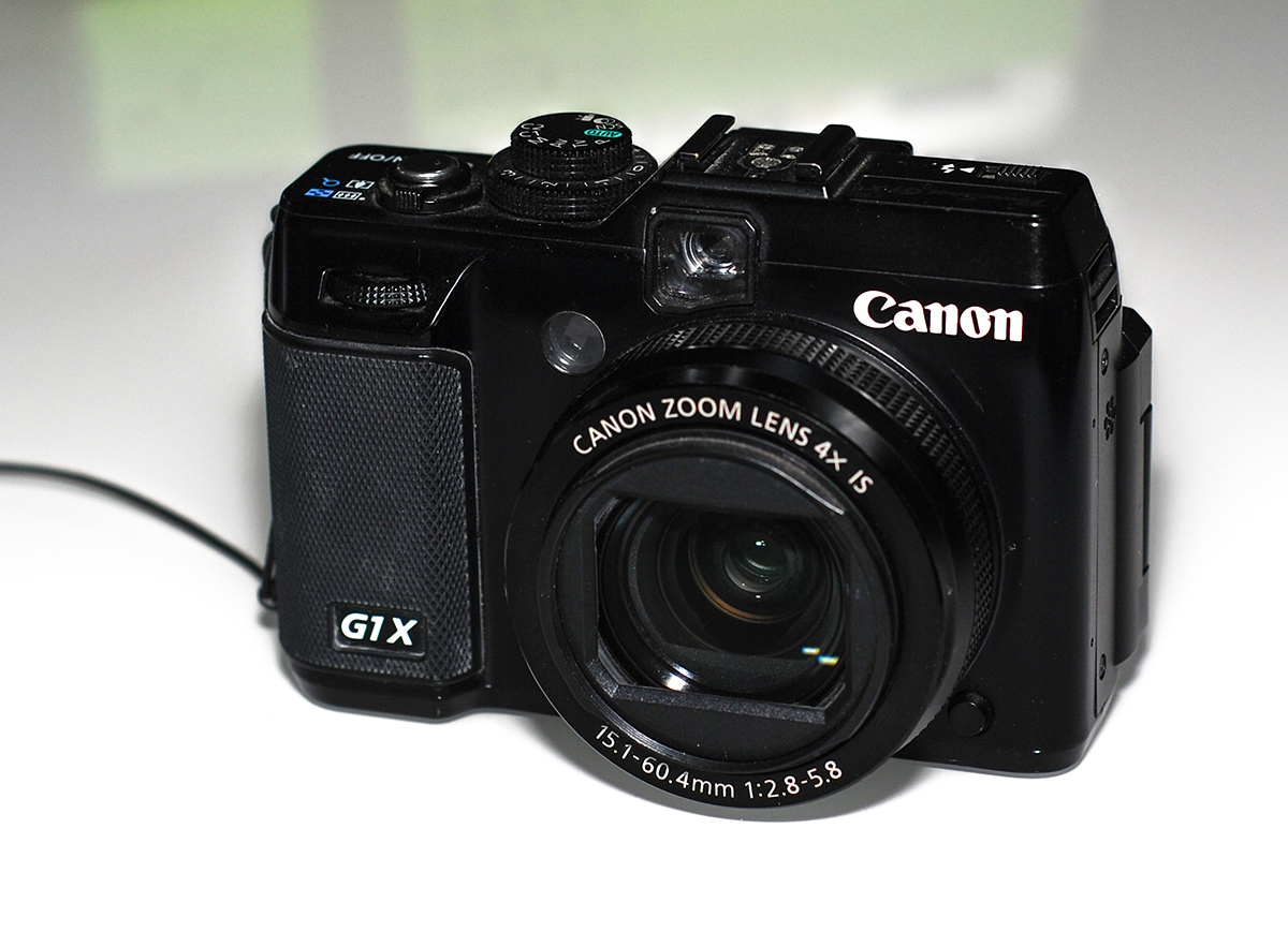 佳能g1x是微单还是卡片机,佳能g16g1x