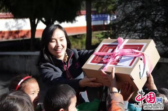 成都信息工程大学银杏酒店管理学院再走山区，续写暖足情