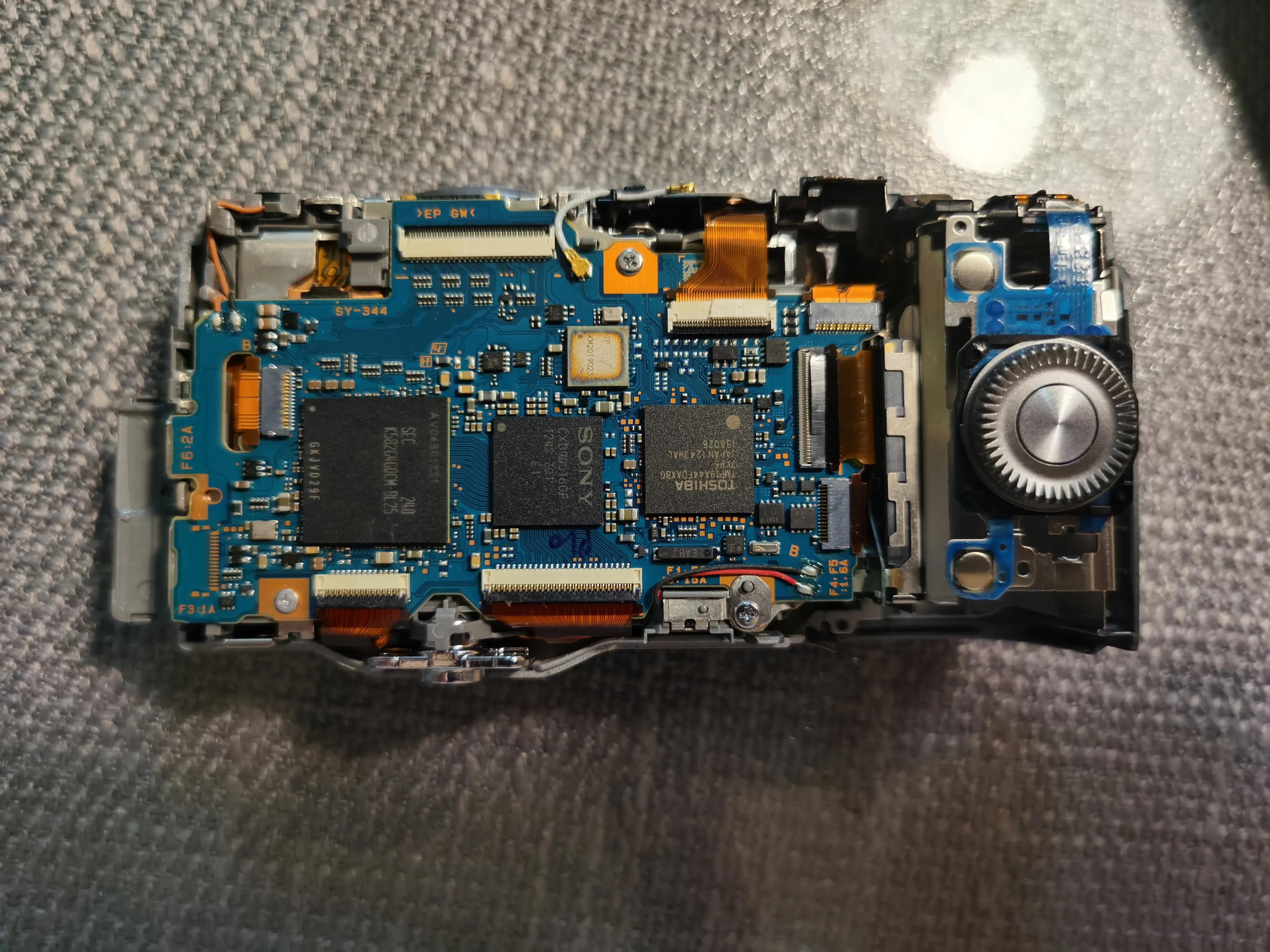 索尼相机更换快门组件,索尼微单相机电池盖拆卸教程