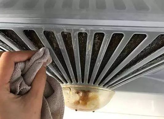 油烟机网罩孔里的油污怎么擦拭,油烟机油污用什么最好