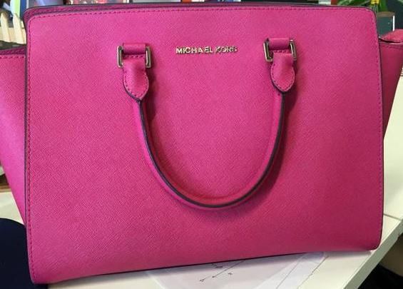 mk经典款包包是什么皮,mk贝壳包包官网价格