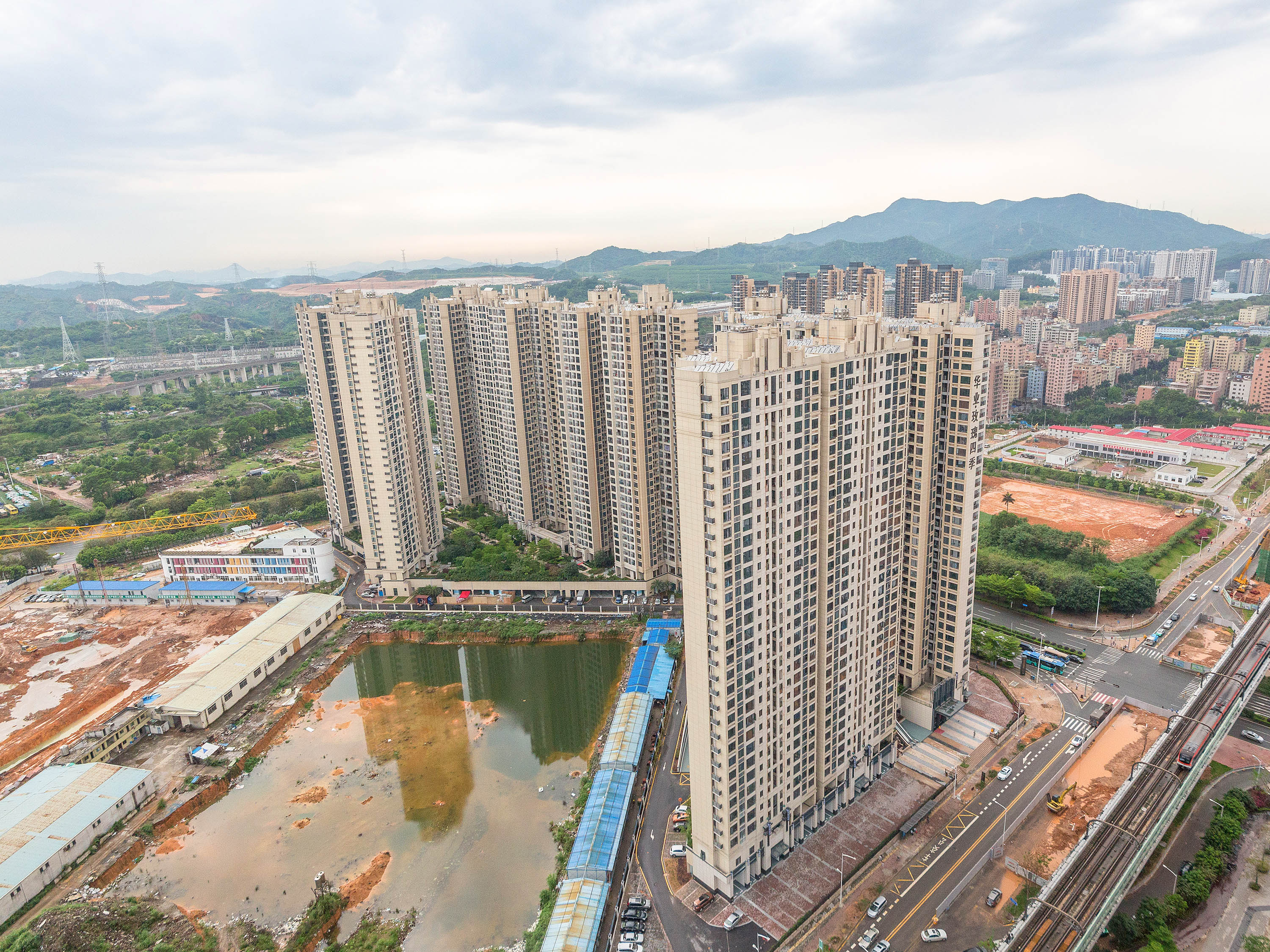 华业玫瑰四季二期真实成交价,华业玫瑰四季一期房价