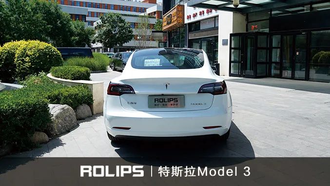 梦幻火山灰特斯拉model3焕新版,特斯拉model3竞速橙配悬浮黑顶