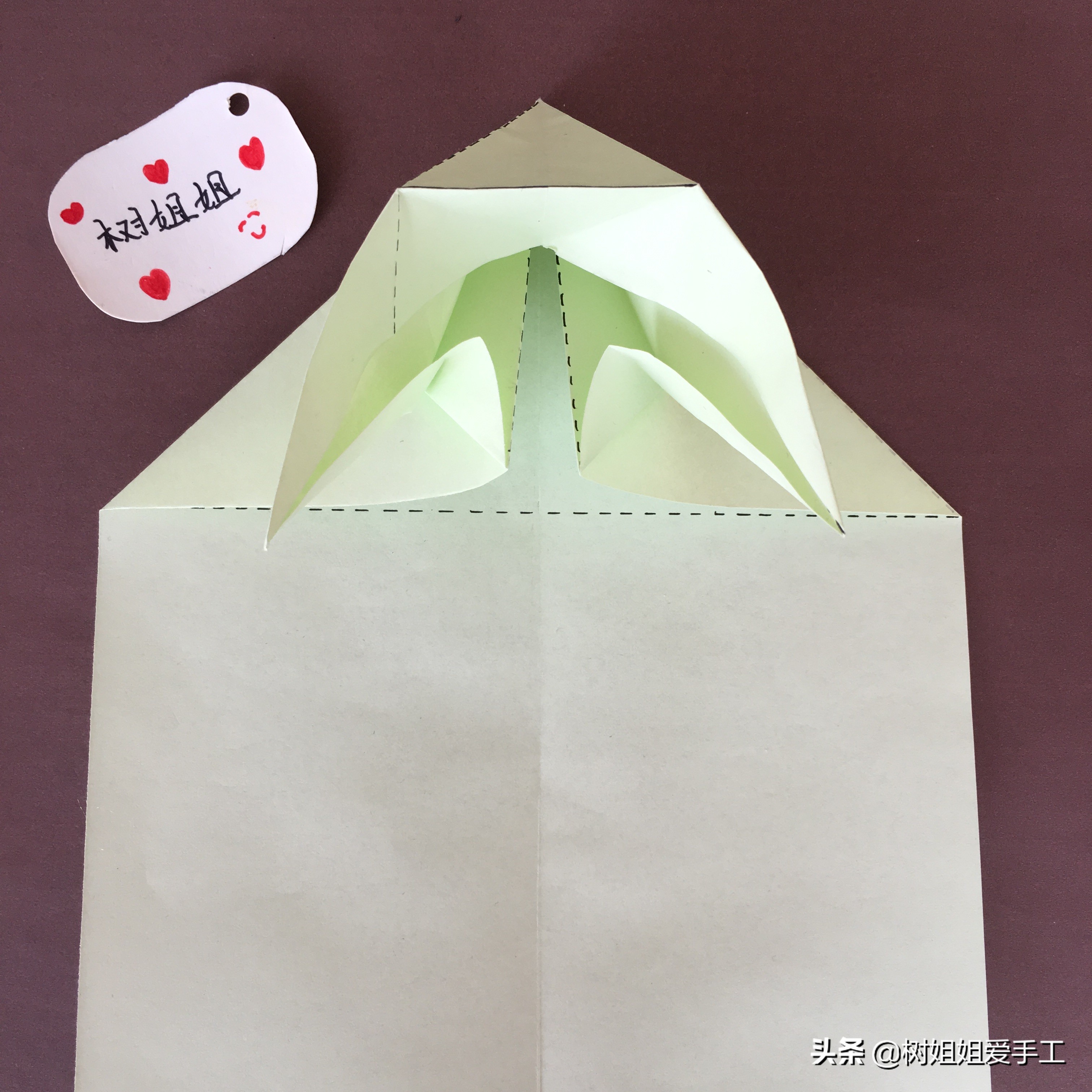 拖尾孔雀的三角插教程,折纸孔雀尾巴怎么折