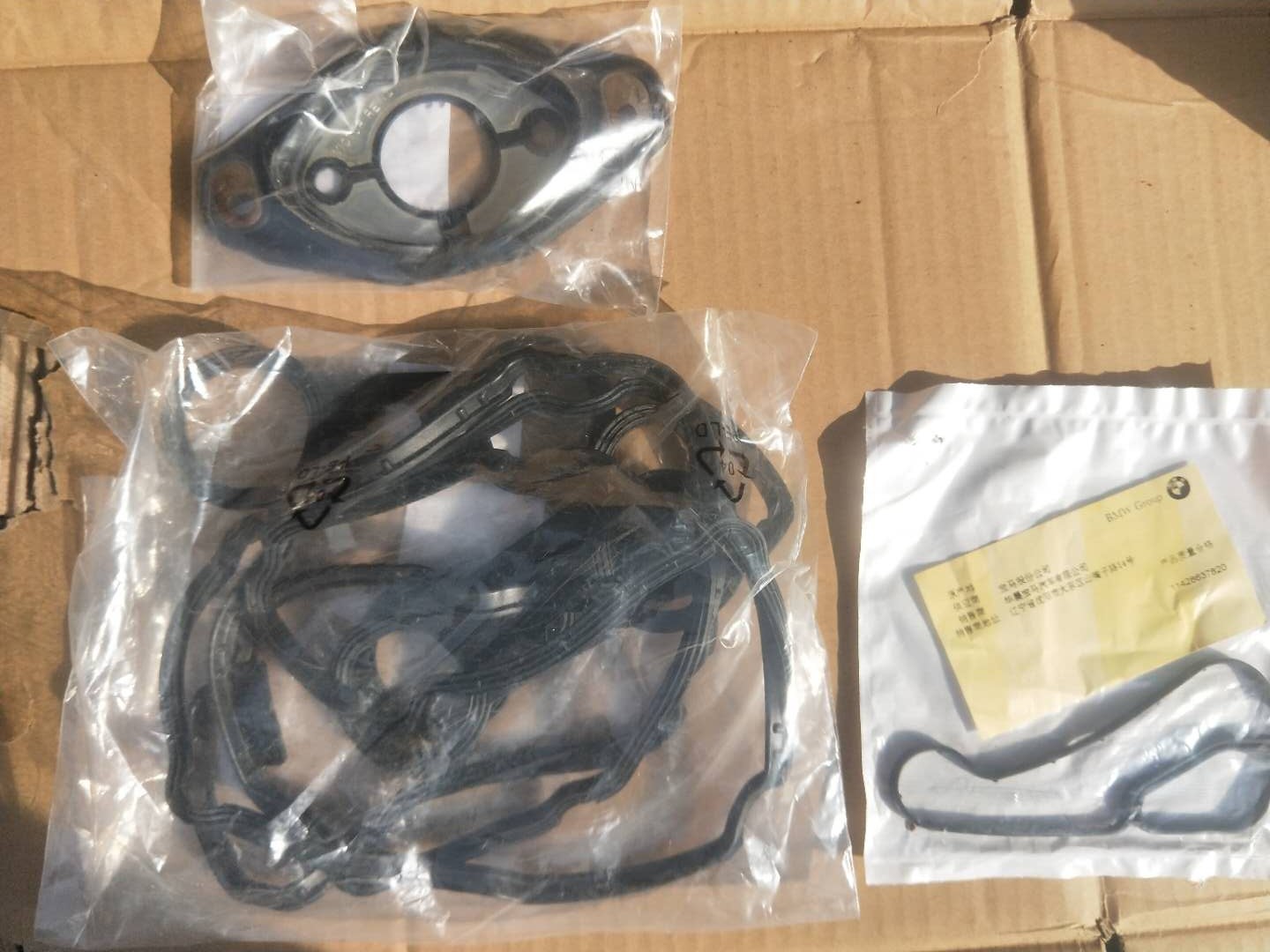 2010款宝马523发动机漏油,宝马523li发动机维修翻新