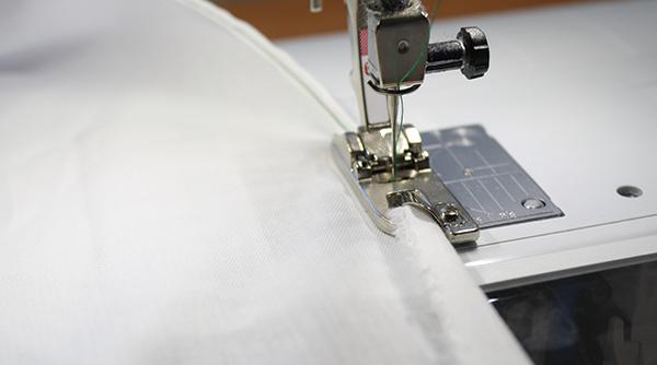 大弧形下摆卷边的技巧,下摆最快卷边手法视频