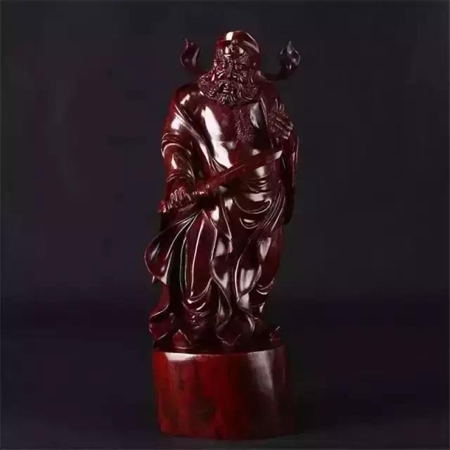 木雕兽头什么寓意,长颈鹿木雕婚礼摆件有什么寓意