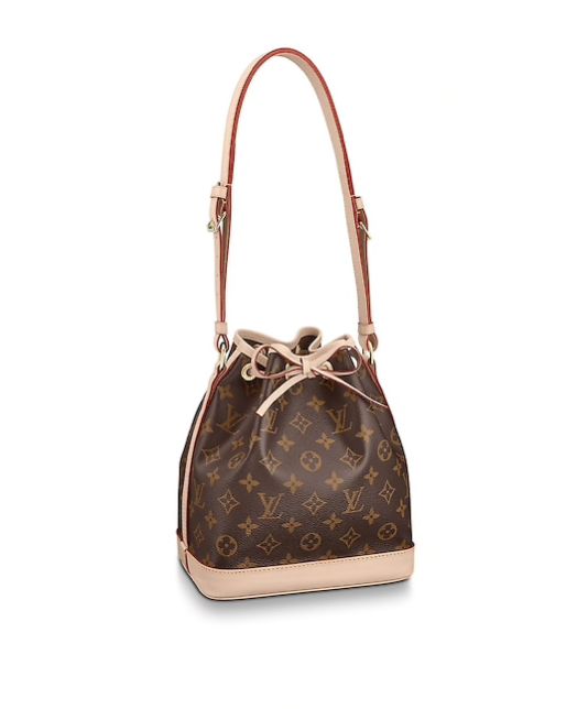 会背水桶包的人,会背奢侈品包包