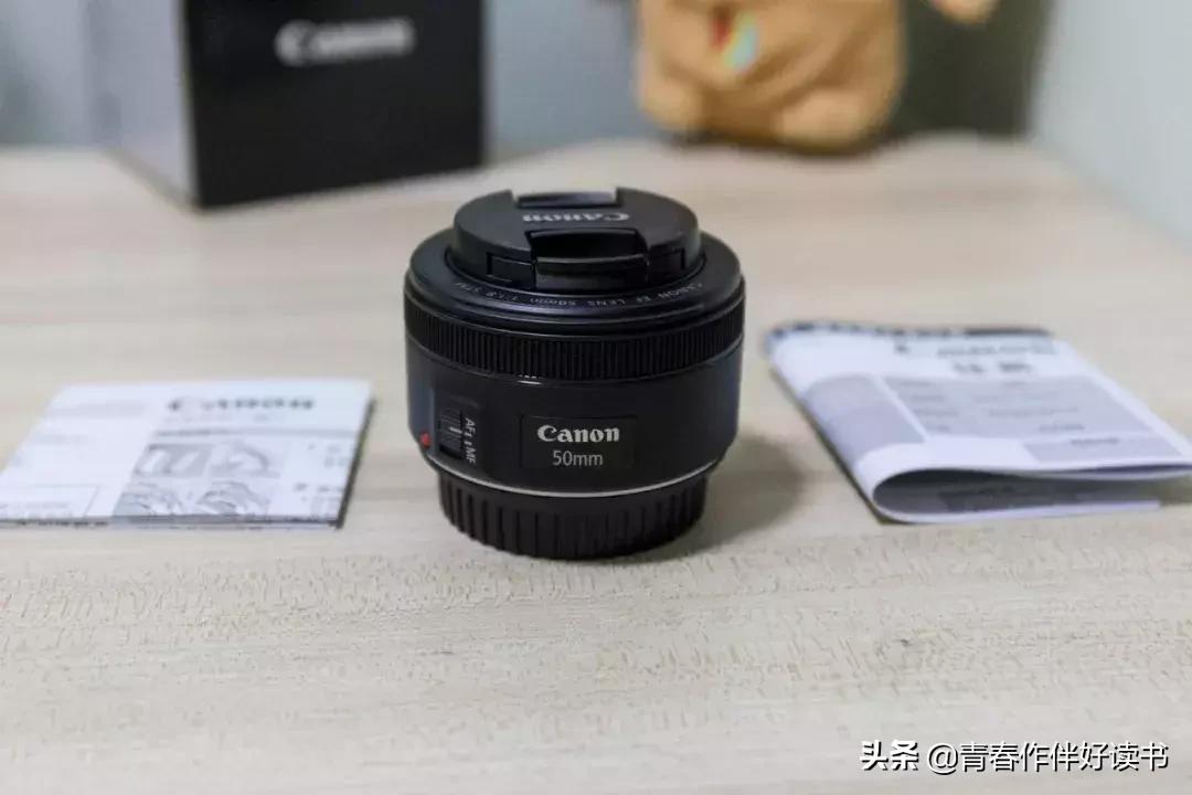 50定焦小痰盂镜头怎么调远近,50mm定焦镜头是小痰盂吗