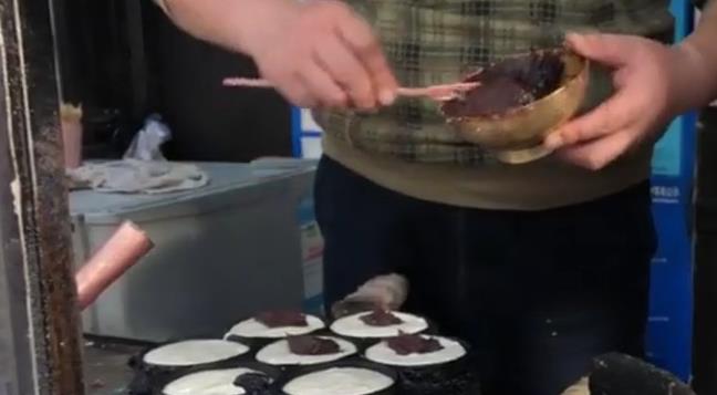 梅花糕一锅卖,梅花糕店铺