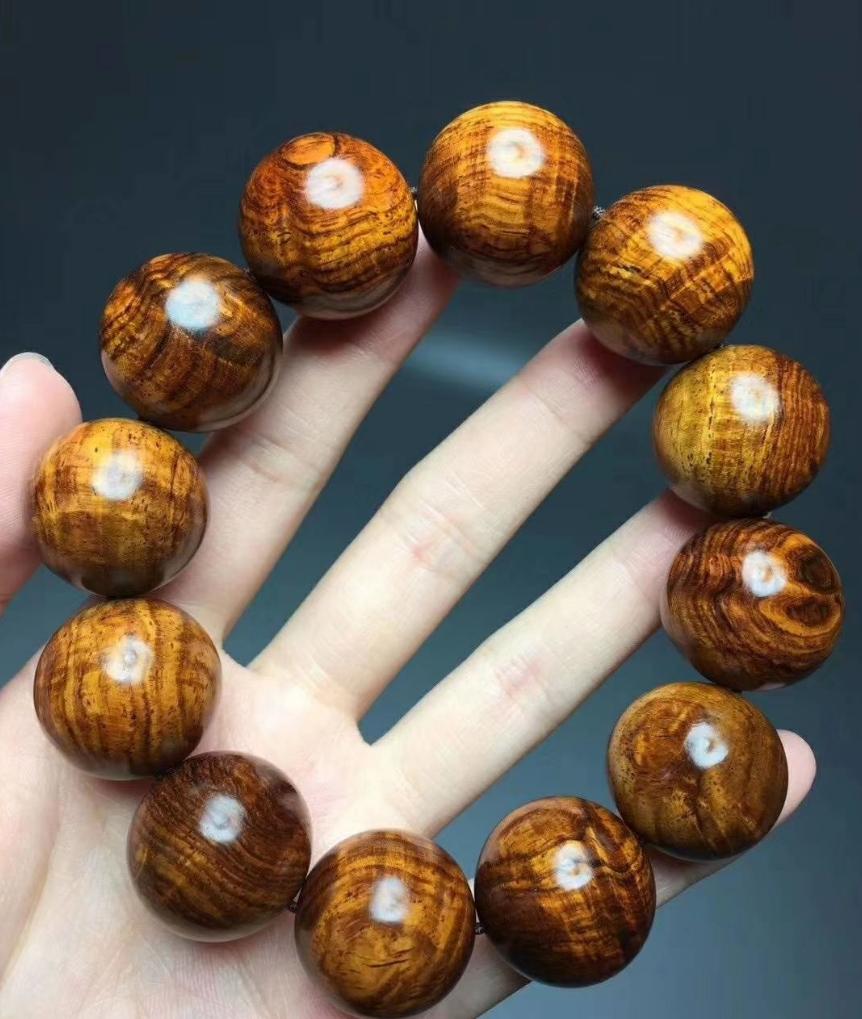 黄花梨木和红木哪个珍贵,越南黄花梨木是国标红木吗