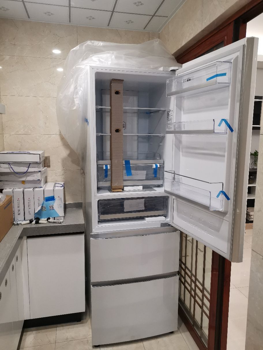 冰箱十字对开好还是双开门好,为什么冰箱双开门比十字开门便宜