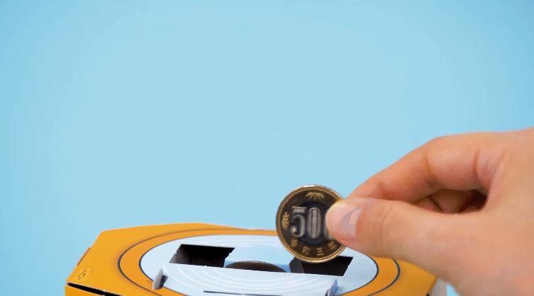 日本儿童杂志赠品胖虎存钱筒,把硬币投下去每次都有胖虎弹出来