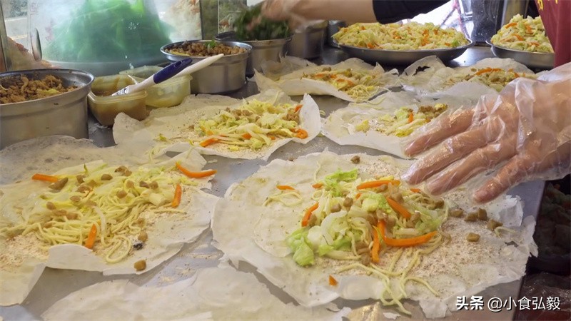 台湾小伙大陆卖小吃,台湾小伙摆摊卖菜饼