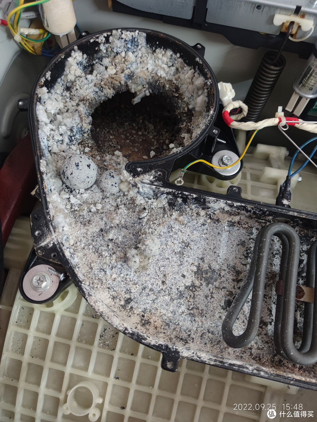 烘干洗衣机烘干处清理,洗衣机风道怎么清洗