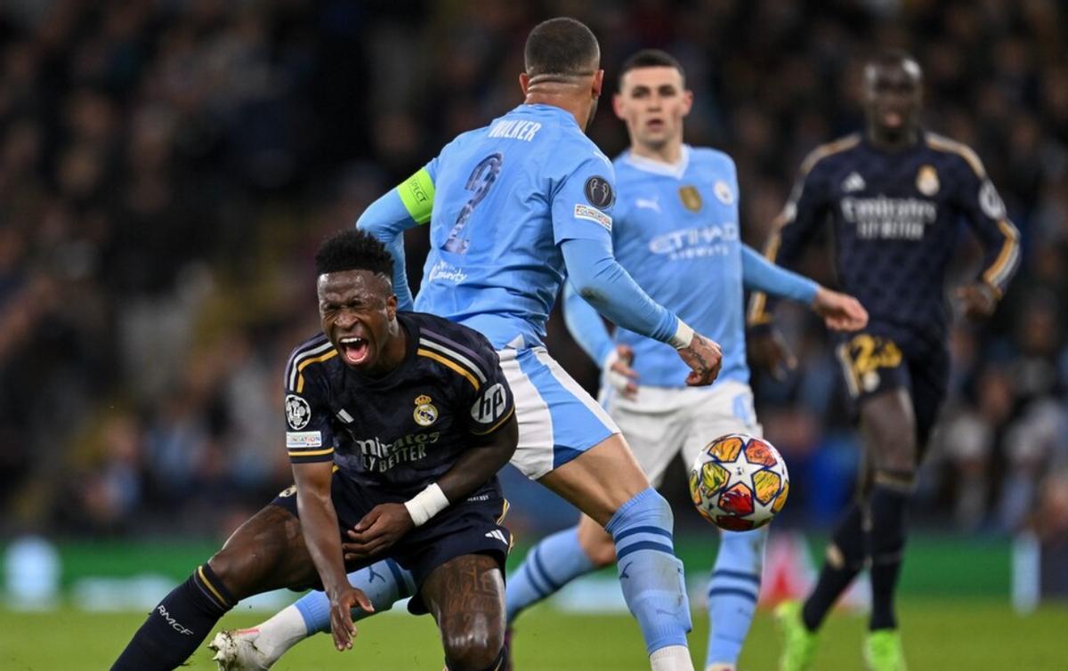 欧冠12-13赛季第一轮皇马3-2曼城,2024欧冠曼城vs皇马点球大战