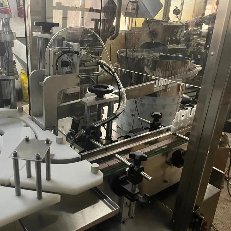 ZHY-50C全自动药品液体*剂喷**灌装机旋盖机