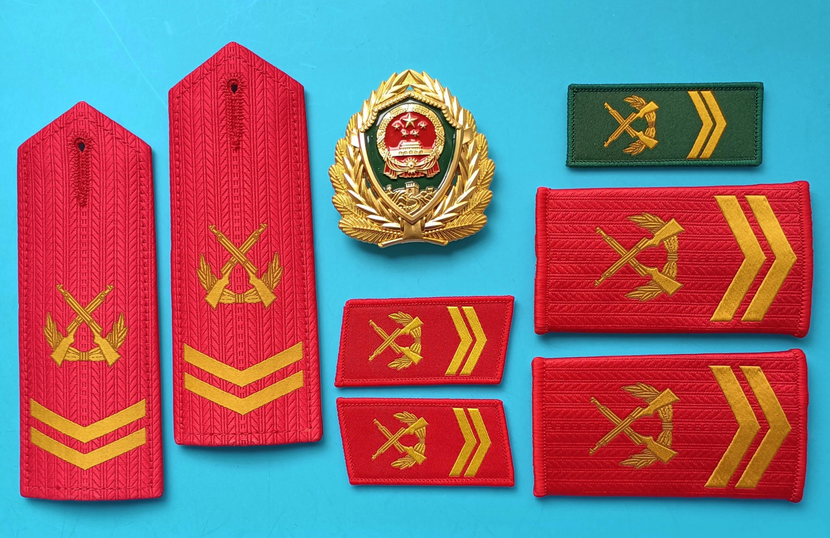 毛启国军装,毛启国警用帽徽